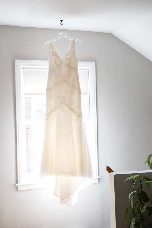 I got my dress used from The Brides Project, which is a non-profit that dedicated to raising funds for free programs for families impacted by cancer at the Cancer Support Community (CSC) of Greater Ann Arbor through the sale of donated bridal gowns.