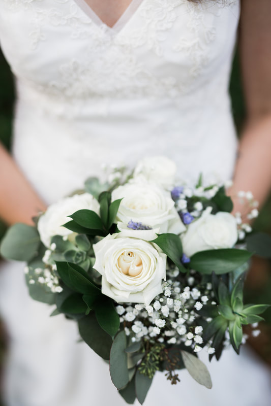The bouquets were simple, with roses, lavender, baby's breath, and succulents. After the wedding, I replanted the succulents and still have some today.